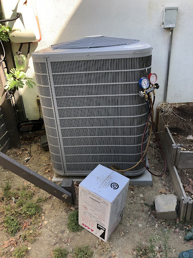 Outdoor air conditioning unit with maintenance tools.